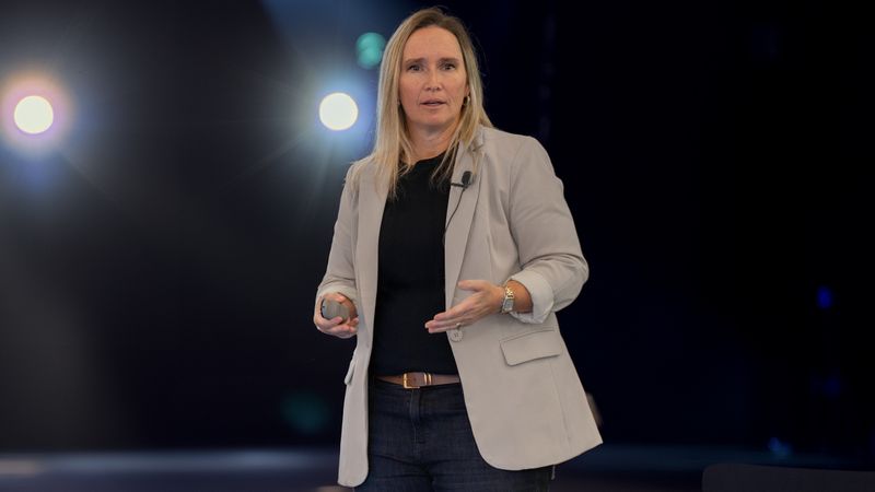 Natty Lewis presenting to audience